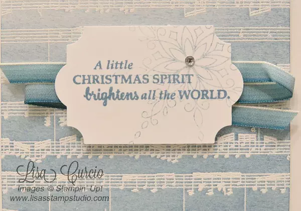 Musical score with a heat emboss resist background. The blue tones are perfect for this wintery Christmas card. Stampin' Up! Sheet Music & Star of Light.