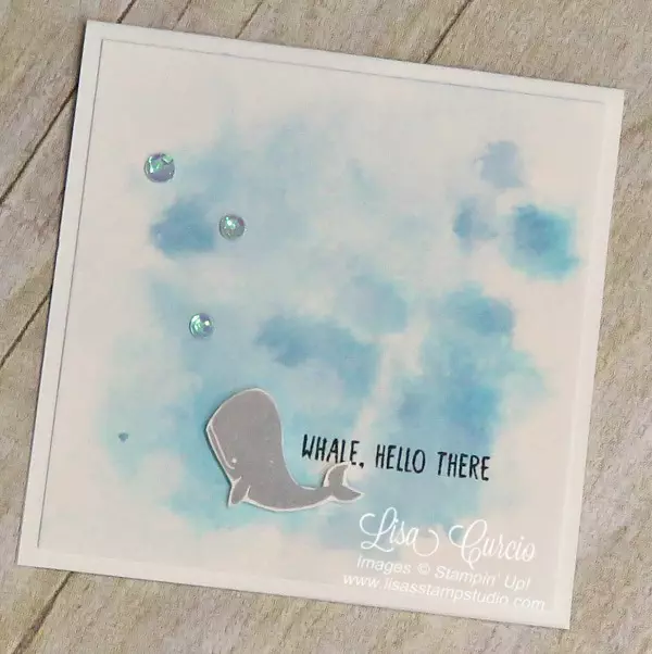 Aerial view of a watercolored background provides the perfect setting for this whale complete with iridescent sequin bubbles. Message in a Bottle by Stampin' Up!